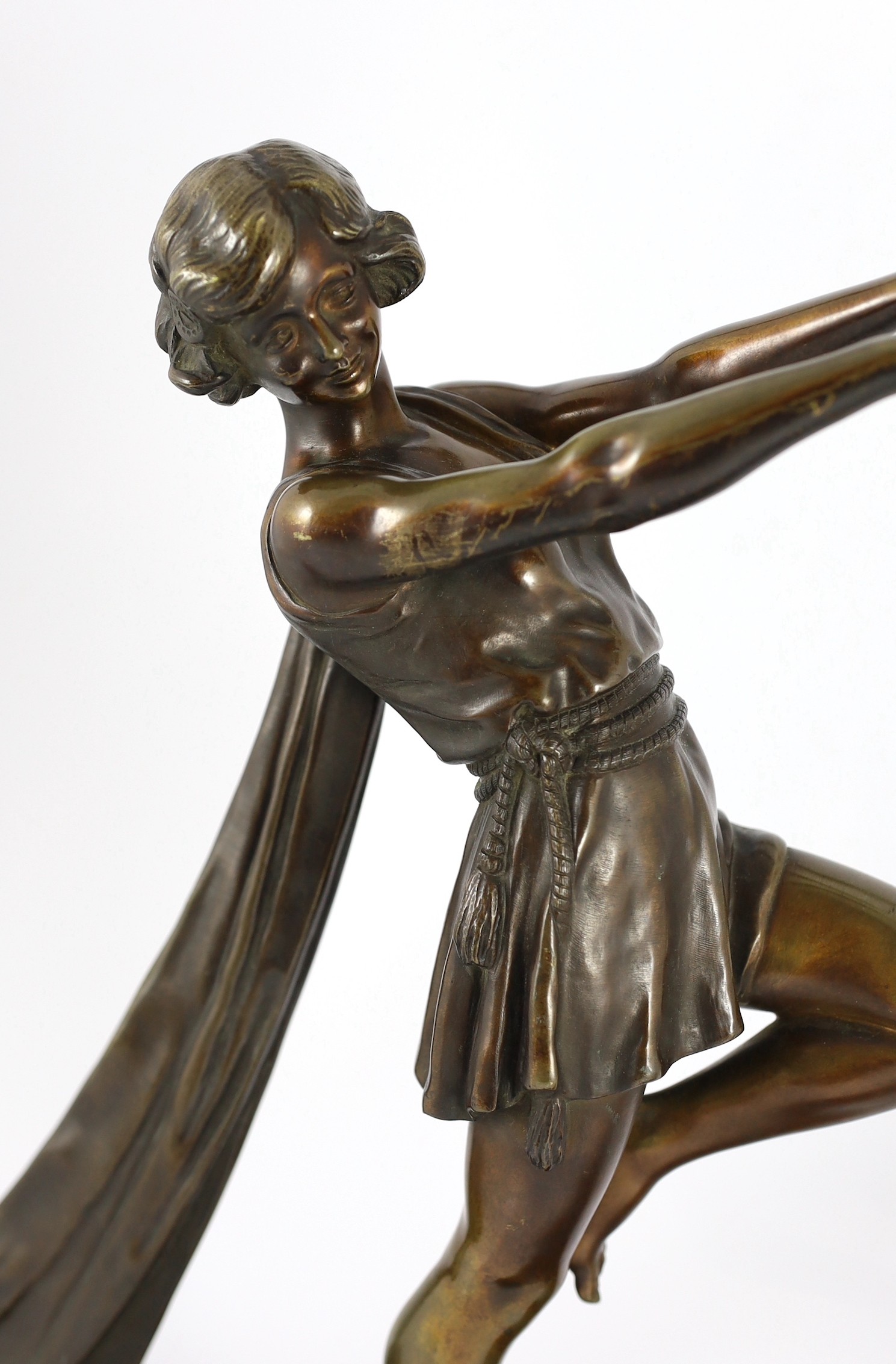 Emile Carlier. A French Art Deco bronze and marble group of a toga dancer with a kid, 71cm wide, 46cm high